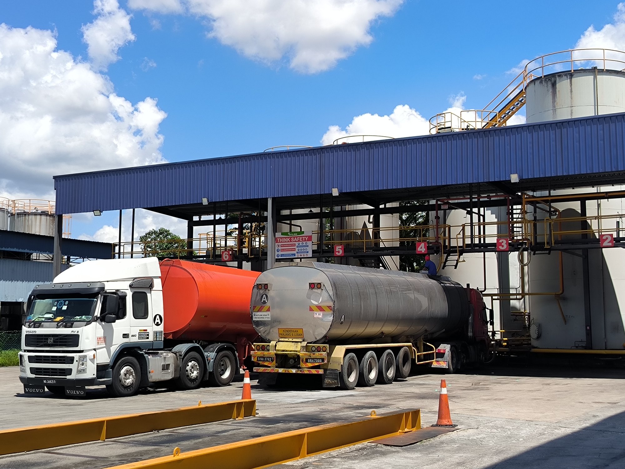 Tanker trucks at a loading bay